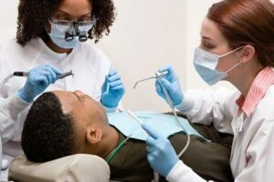 tooth examination is being performed